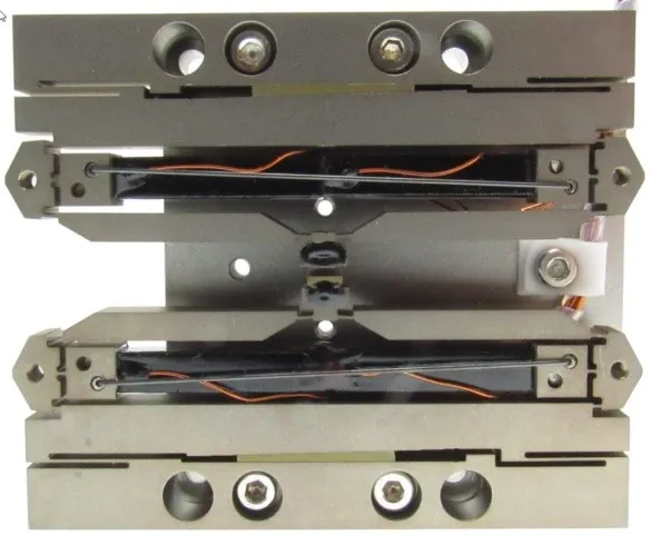 DSM custom PSA piezo actuators configured in a high speed piezo shutter assembly