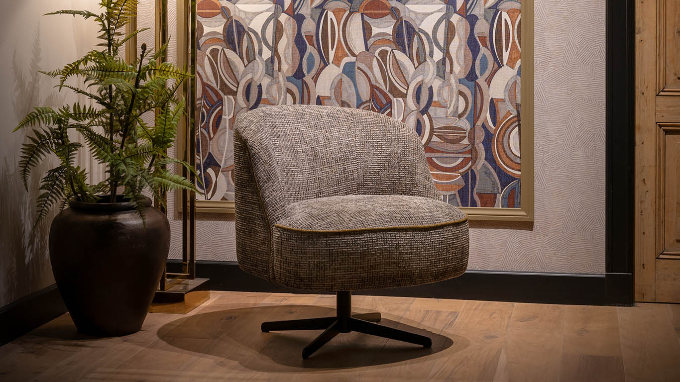 Fleur in bouclé stof, modern en vrouwelijk.