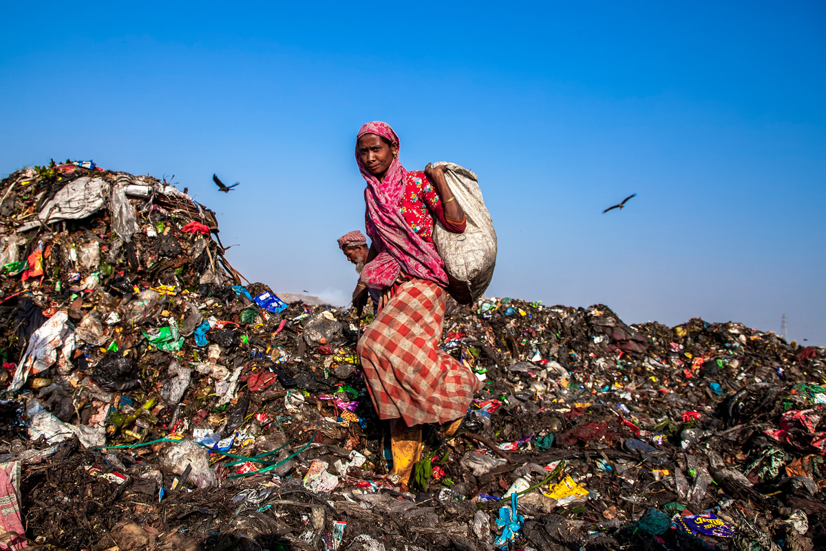 Woman Among Waste