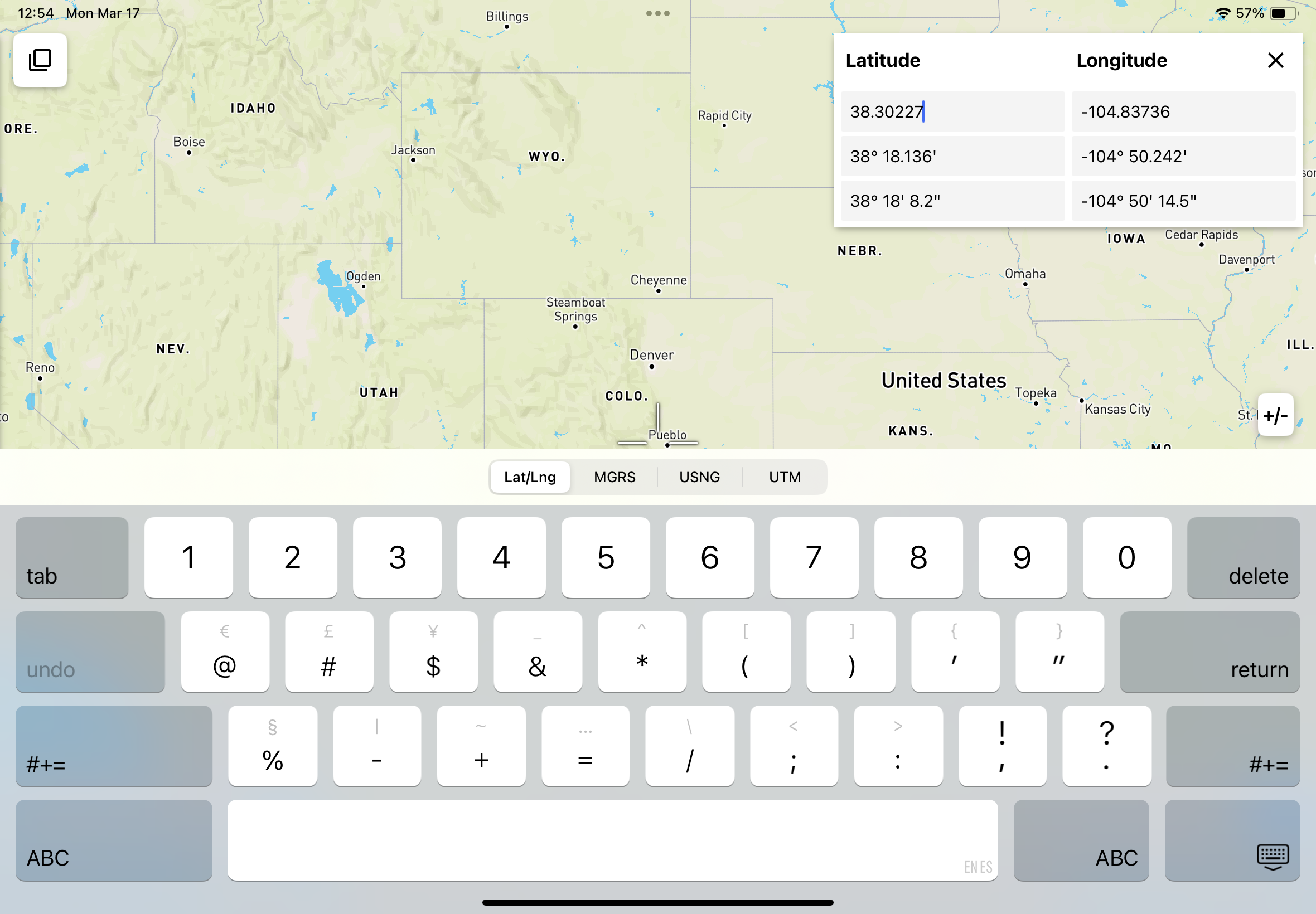 Sample Touch GIS project with the Latitude and Longitude input panel and keyboard open.
