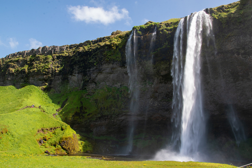 The Seljalandsfoss waterfall is located in the south of Iceland. The Seljalandsá river falls here 66 m deep and is fed by the glacier of Eyjafjallajökull.