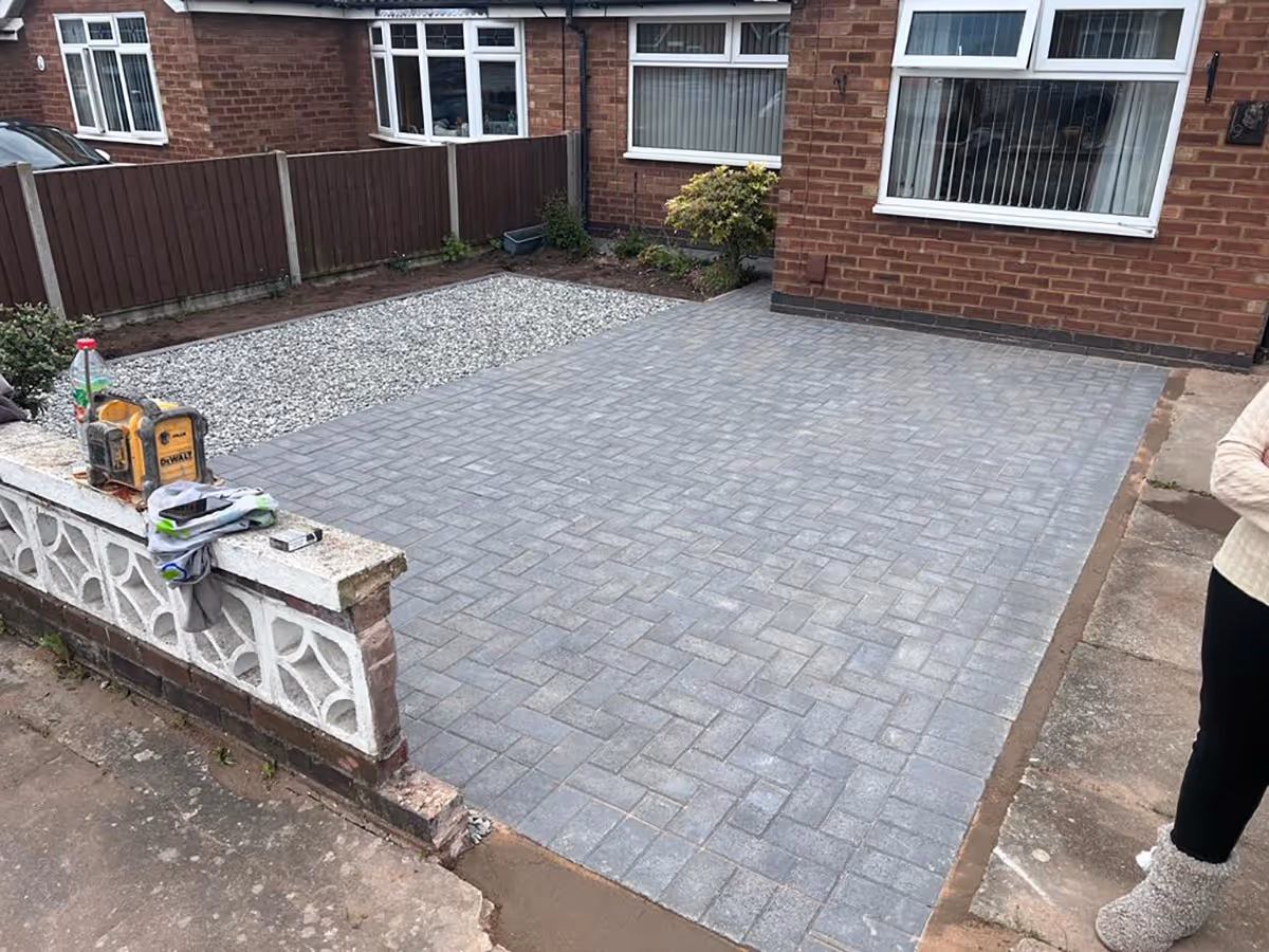 Charcoal block paving driveway with black ice gravel