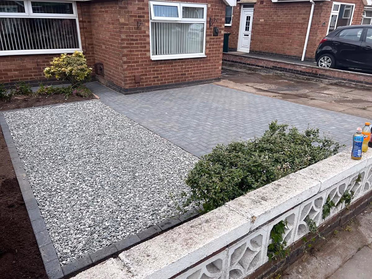 Charcoal block paving driveway with black ice gravel - angle 1