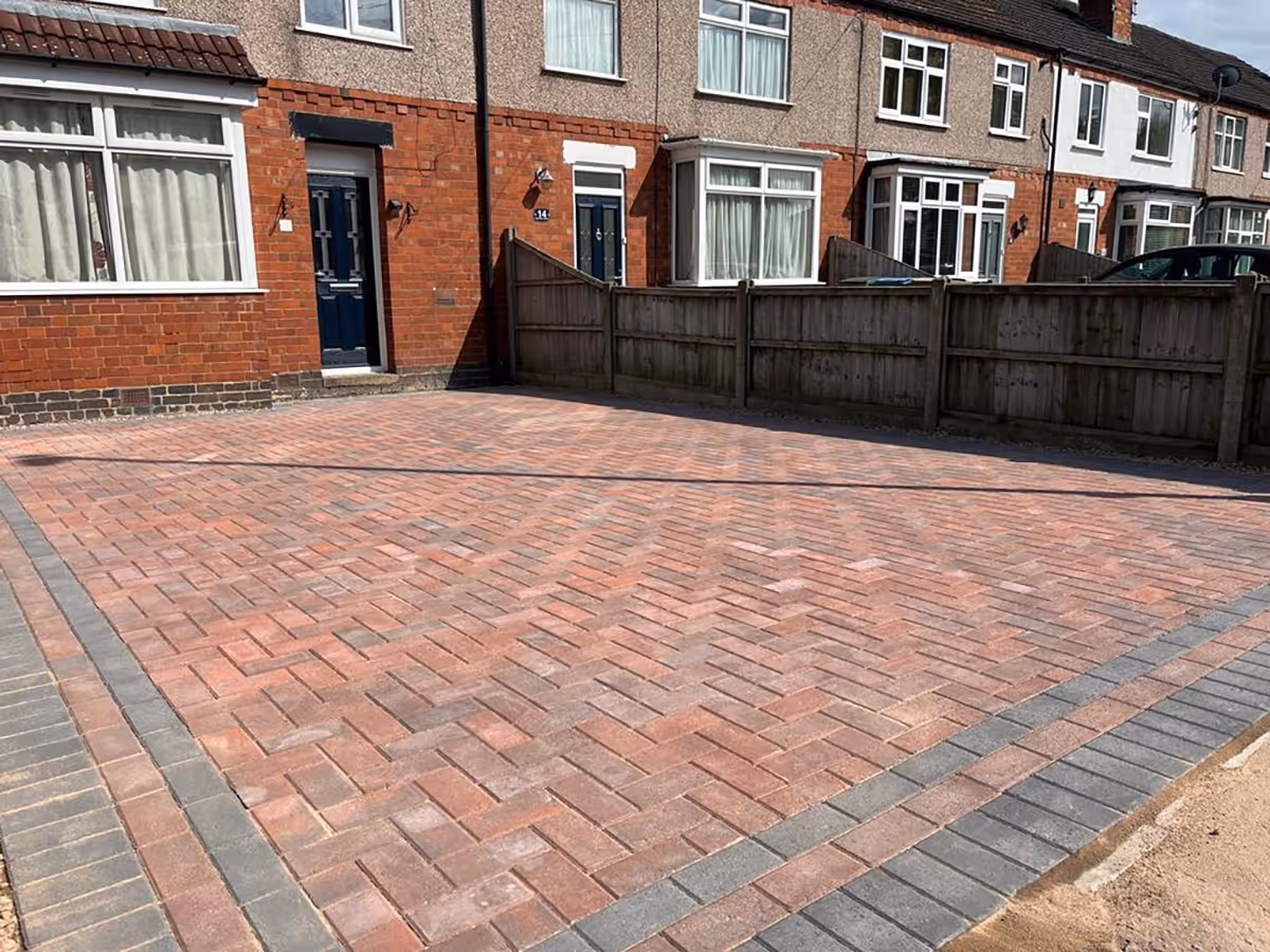 Standard brindle block paving driveway. Triple border with standard charcoal blocks