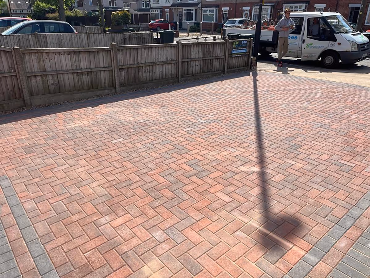 Standard brindle block paving driveway. Triple border with standard charcoal blocks - angle 2