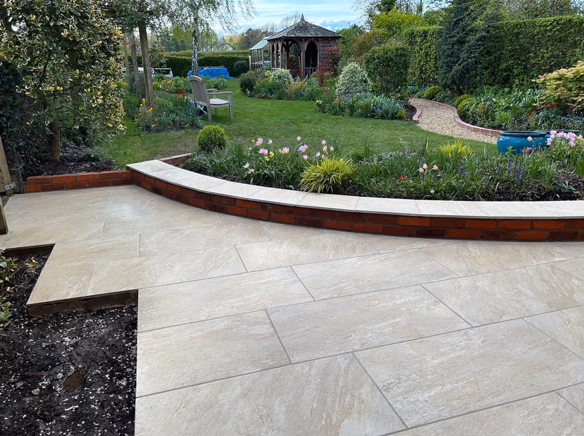 Porcelain patio with retaining wall 