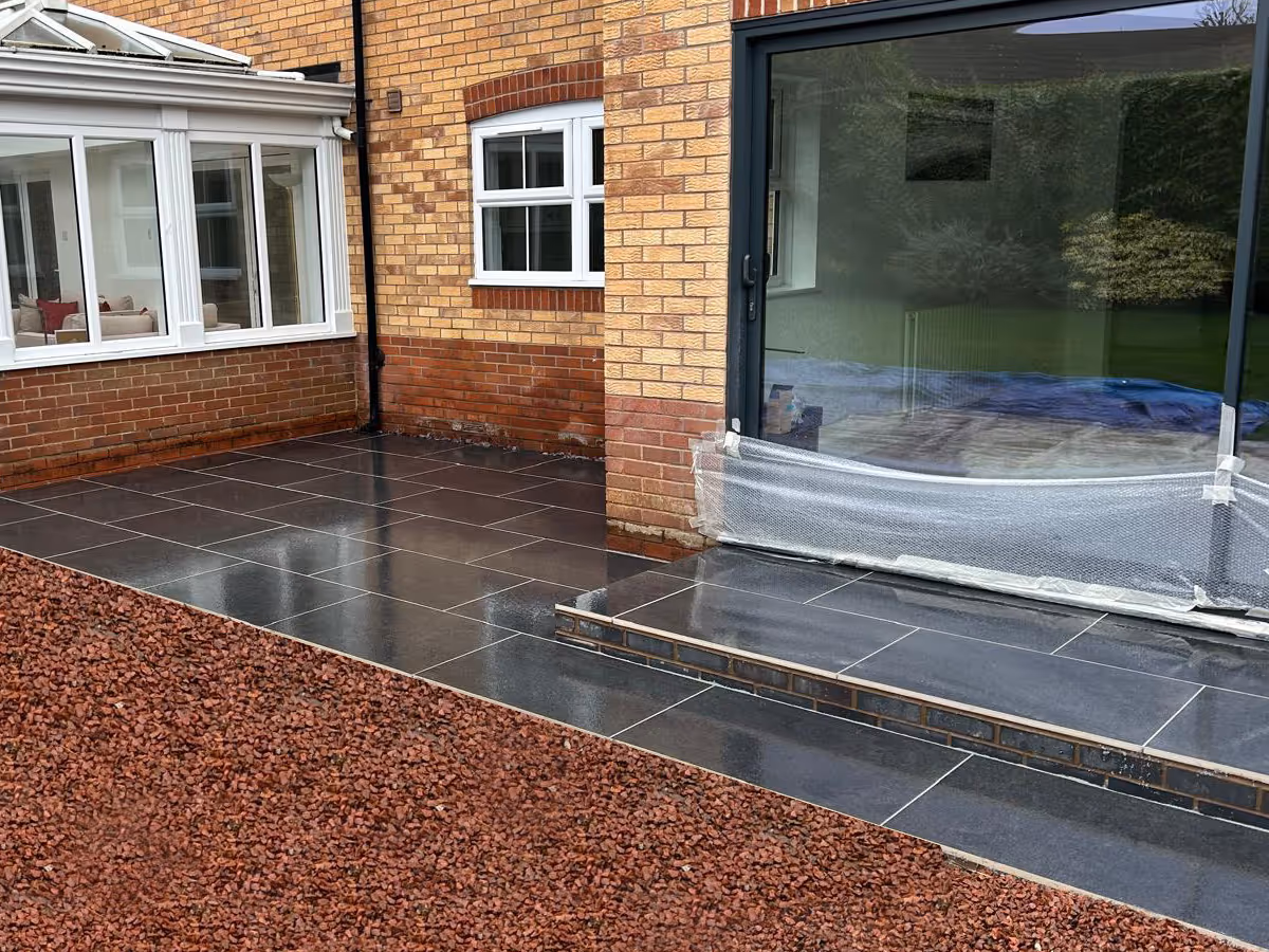 Black porcelain patio with step 