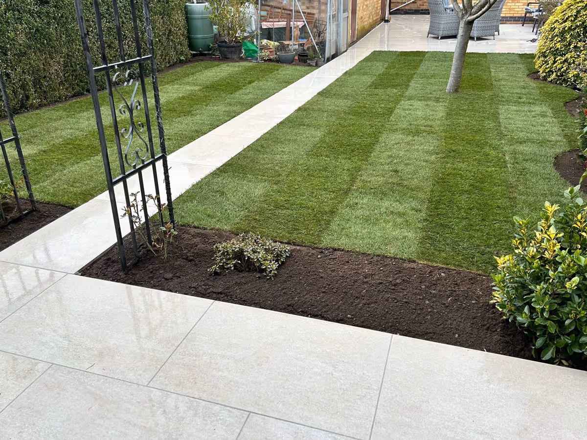 Porcelain patio and pathway and new lawn