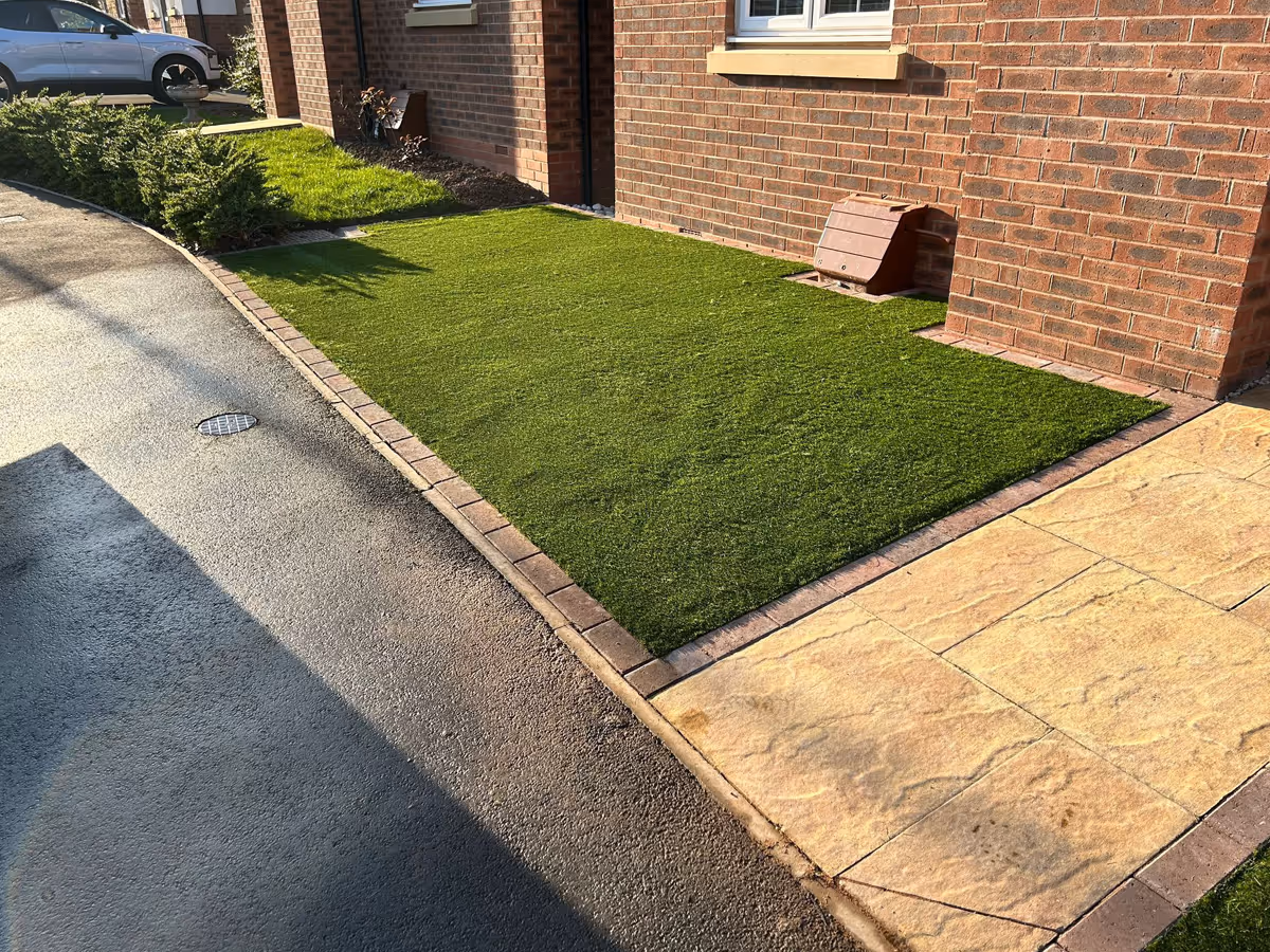 Natural stone path and artificial lawn - angle 1