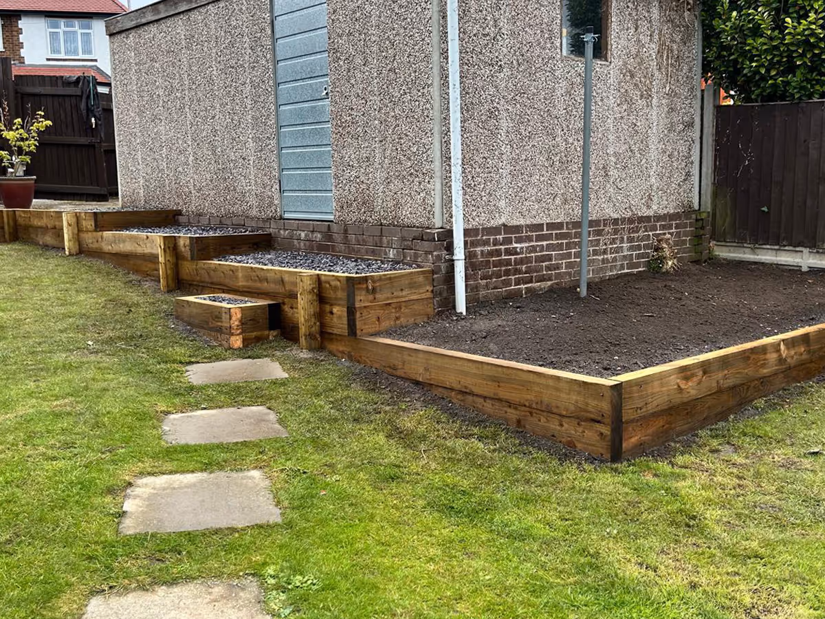 Sleeper retaining wall and planers 