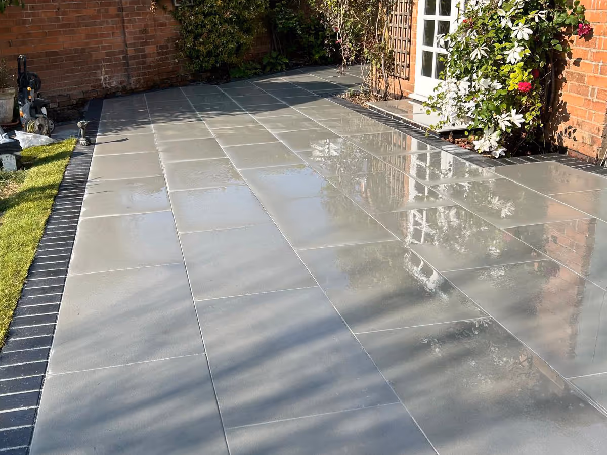 Total Stone Grigio porcelain patio with charcoal pencil edge paving