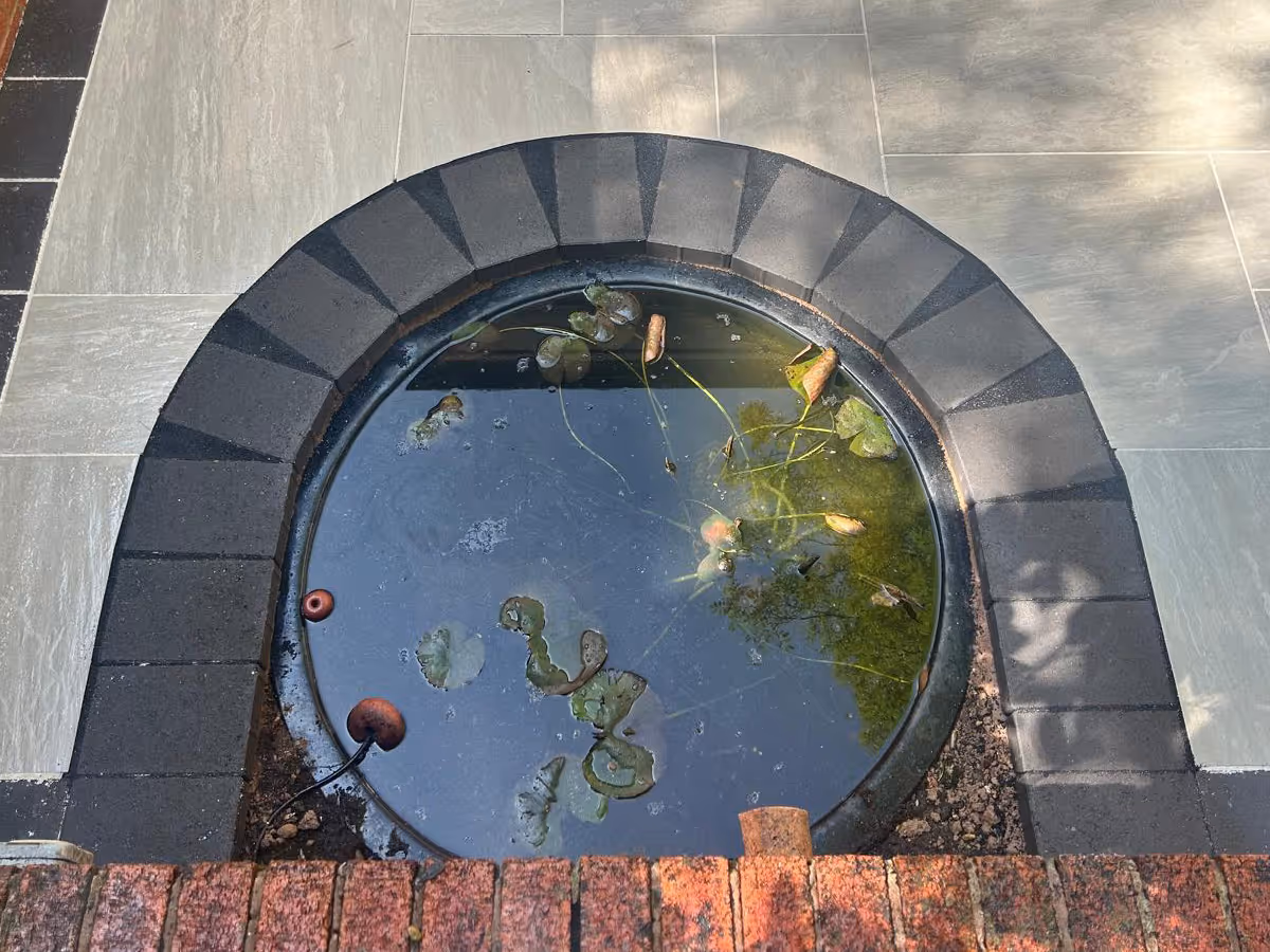 Mixed-size porcelain slabs with charcoal pencil edge paving - angle 3