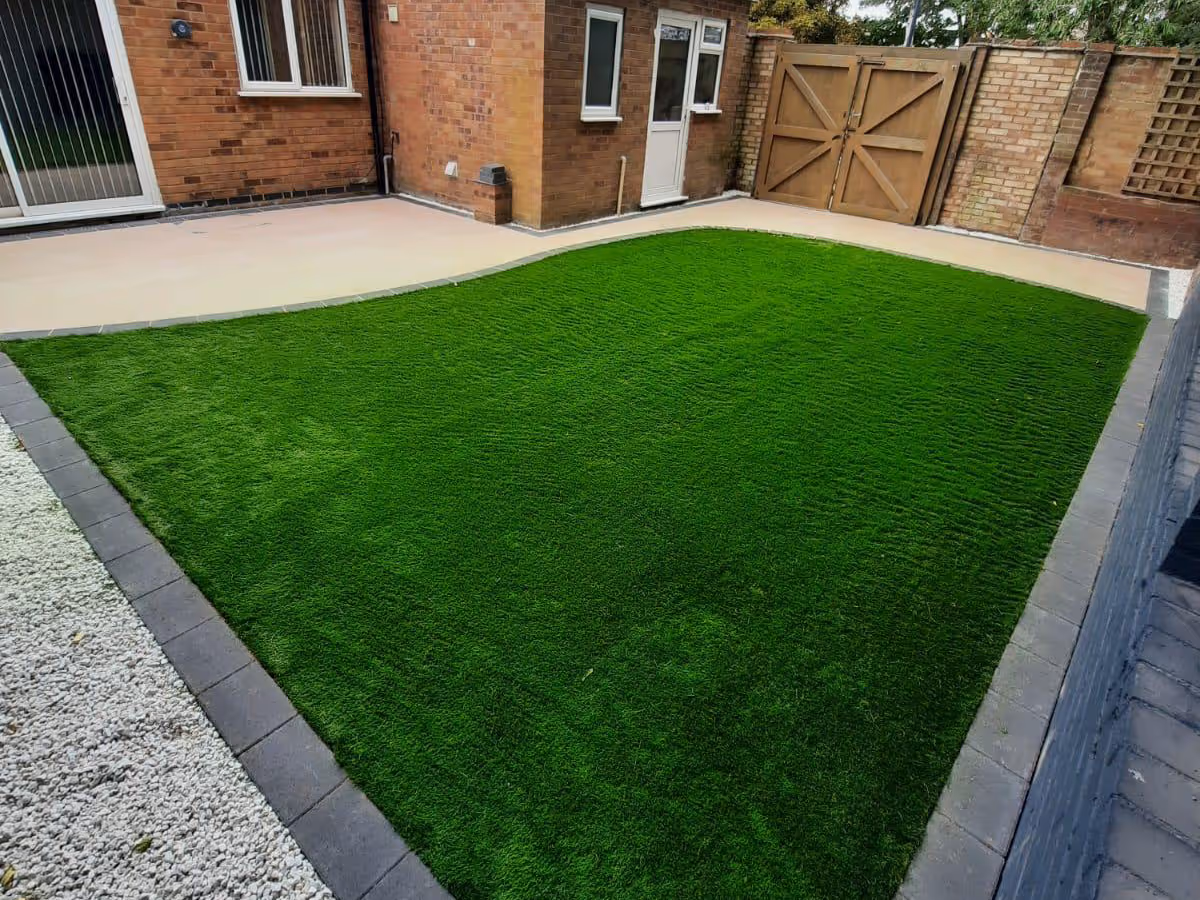 Porcelain patio, pencil edge paving and artificial turf