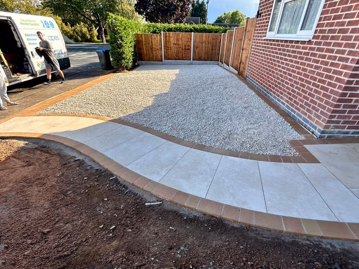 Gravel a natural stone driveway with block paved edges - angle 2