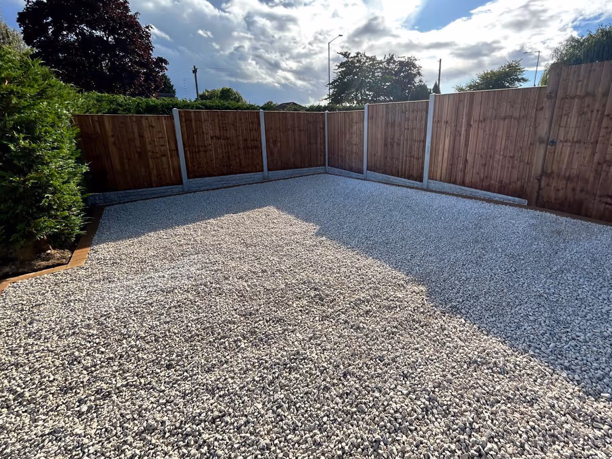 Gravel a natural stone driveway with block paved edges - angle 4