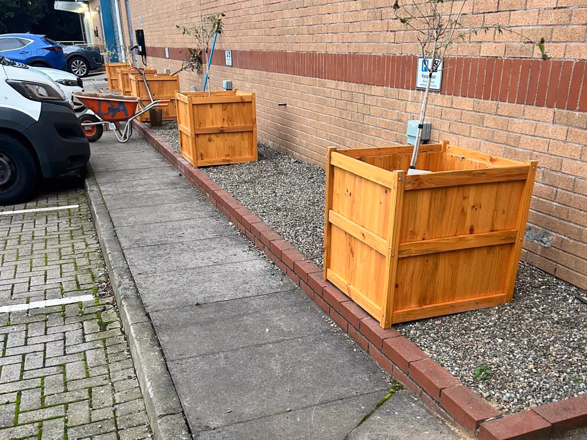 Gravel boarder with block edge and planters - angle 2