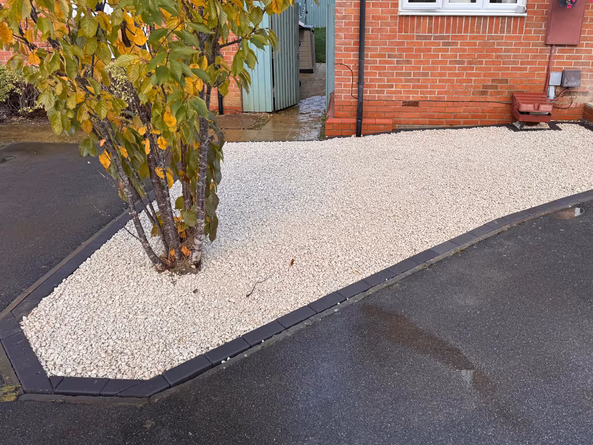 Gravel are on driveway