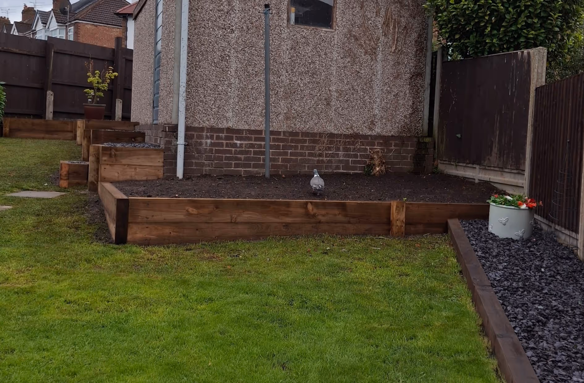 Sleeper retaining wall and beds