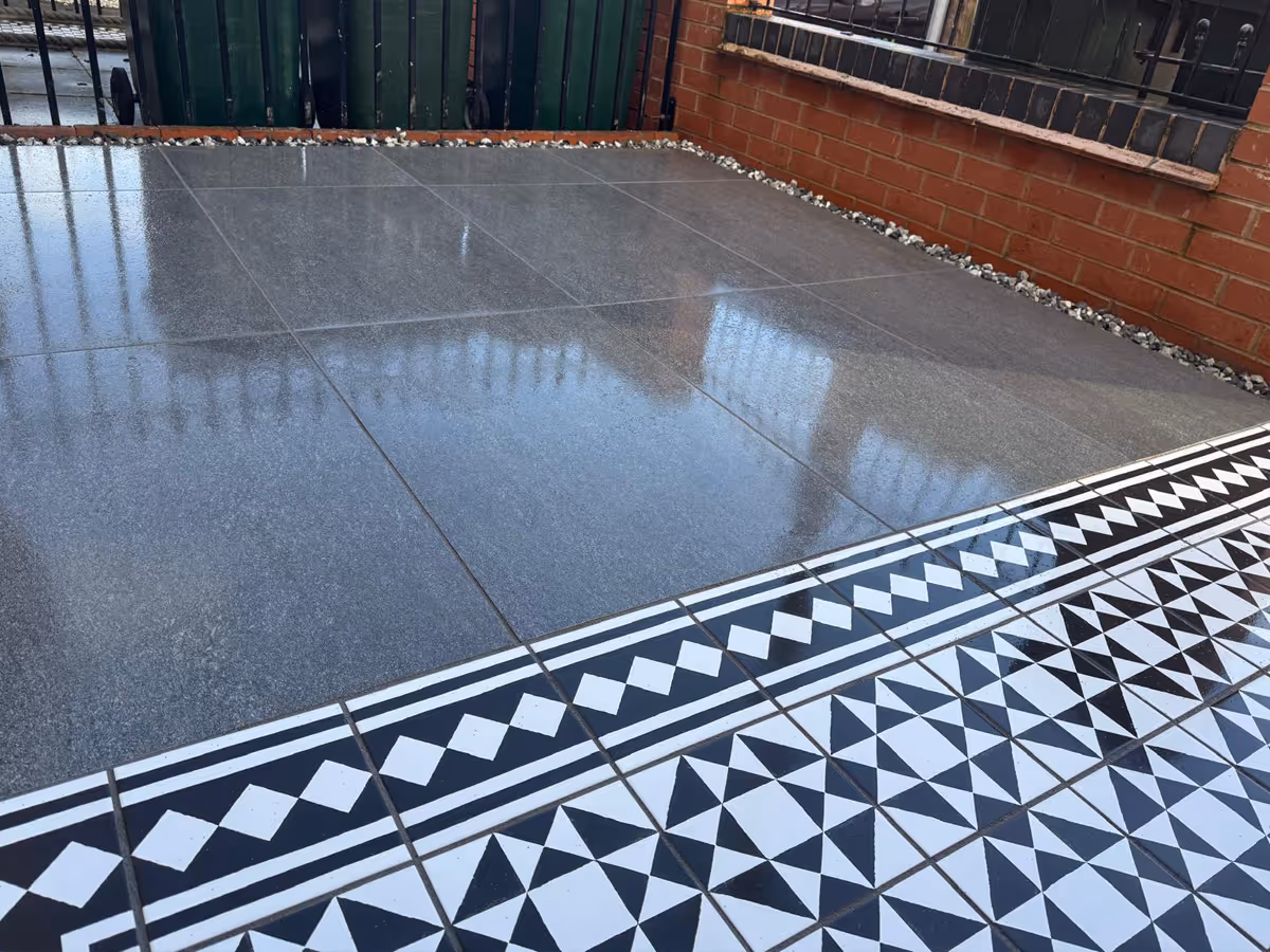 Decorative porcelain slabs in front garden