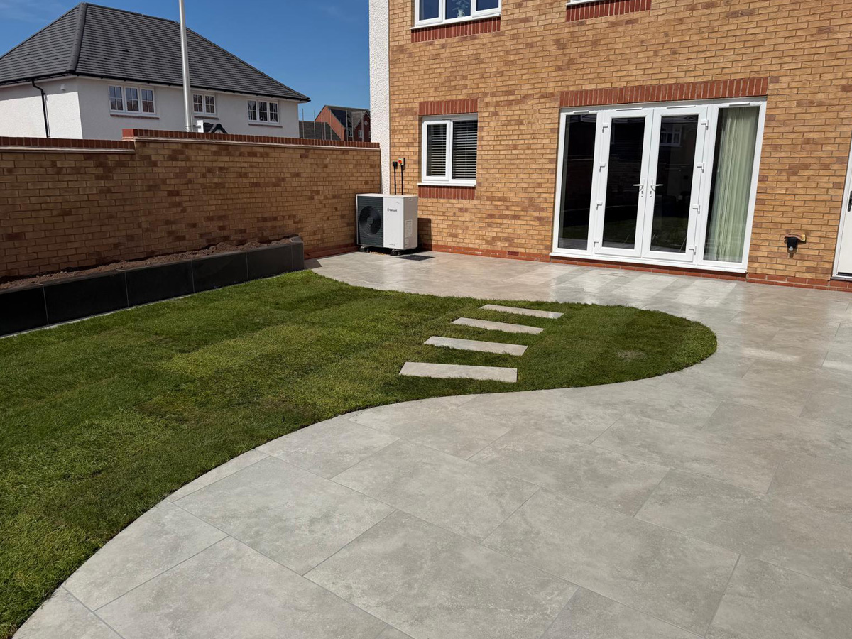 Grey porcelain patio and lawn
