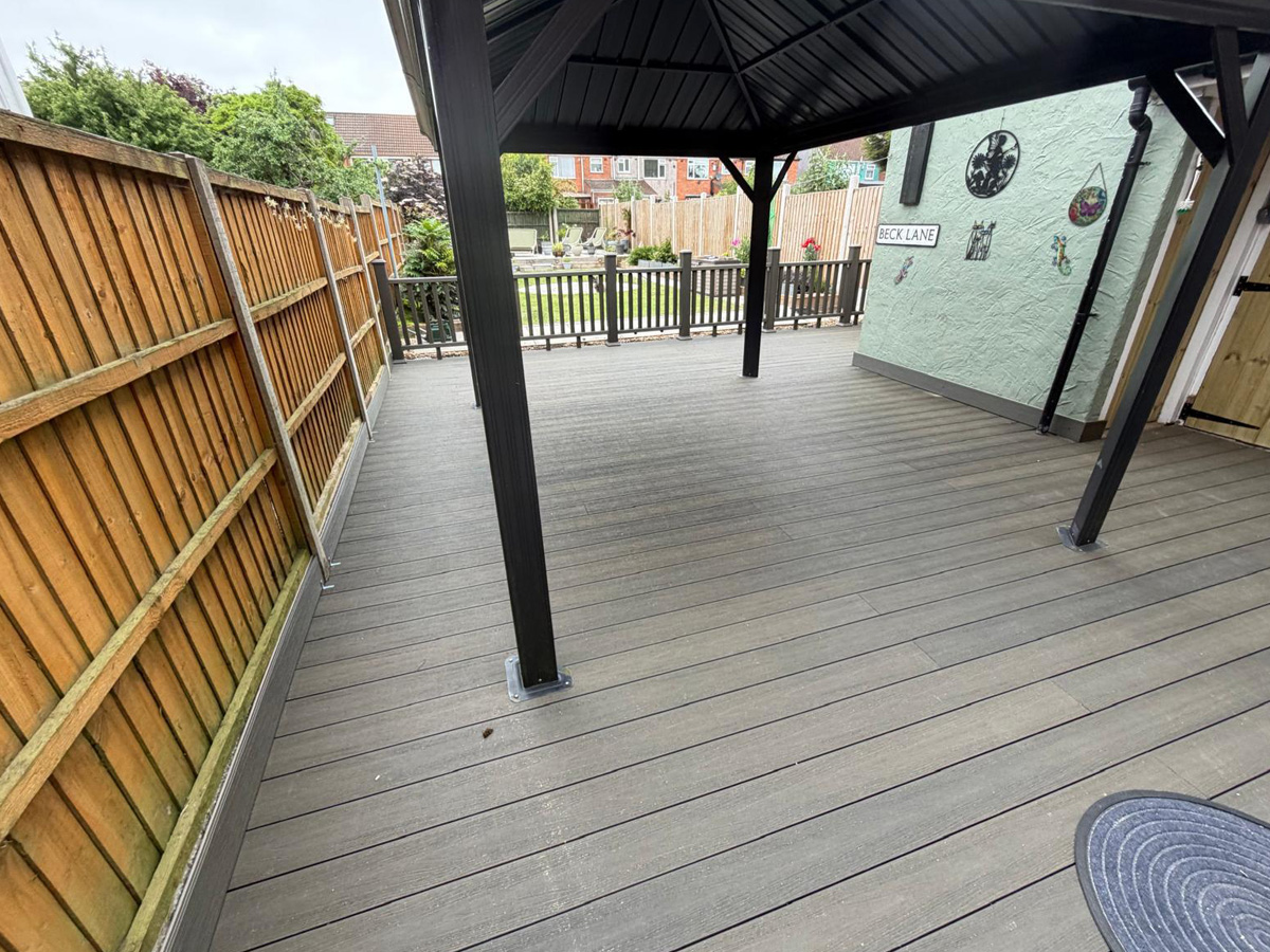 Composite decking and fence. Timber doors.