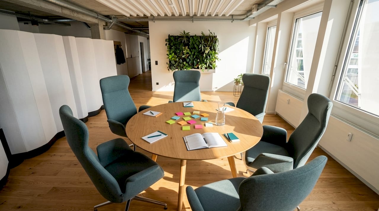 Collaborative meeting area with natural accents and branded colors