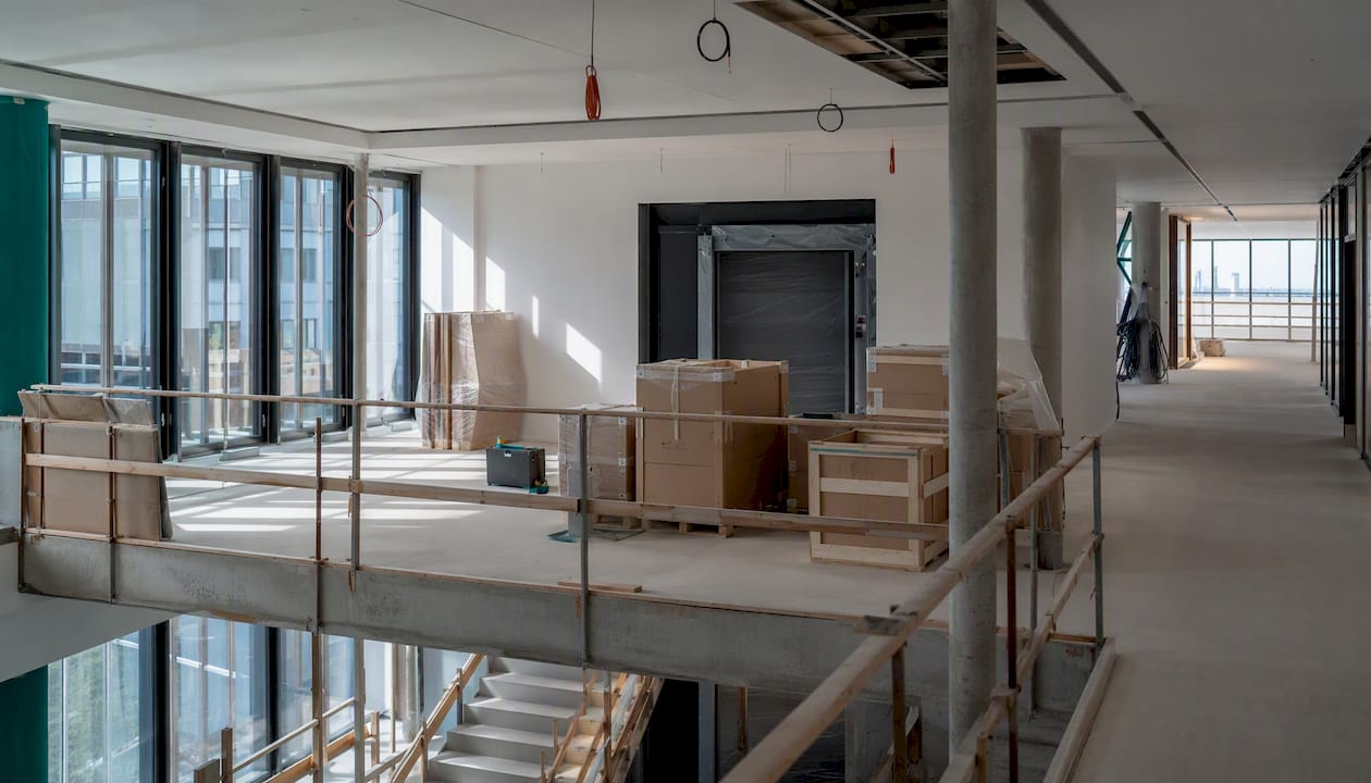 Goods lift and staircase in multi-floor office fitout