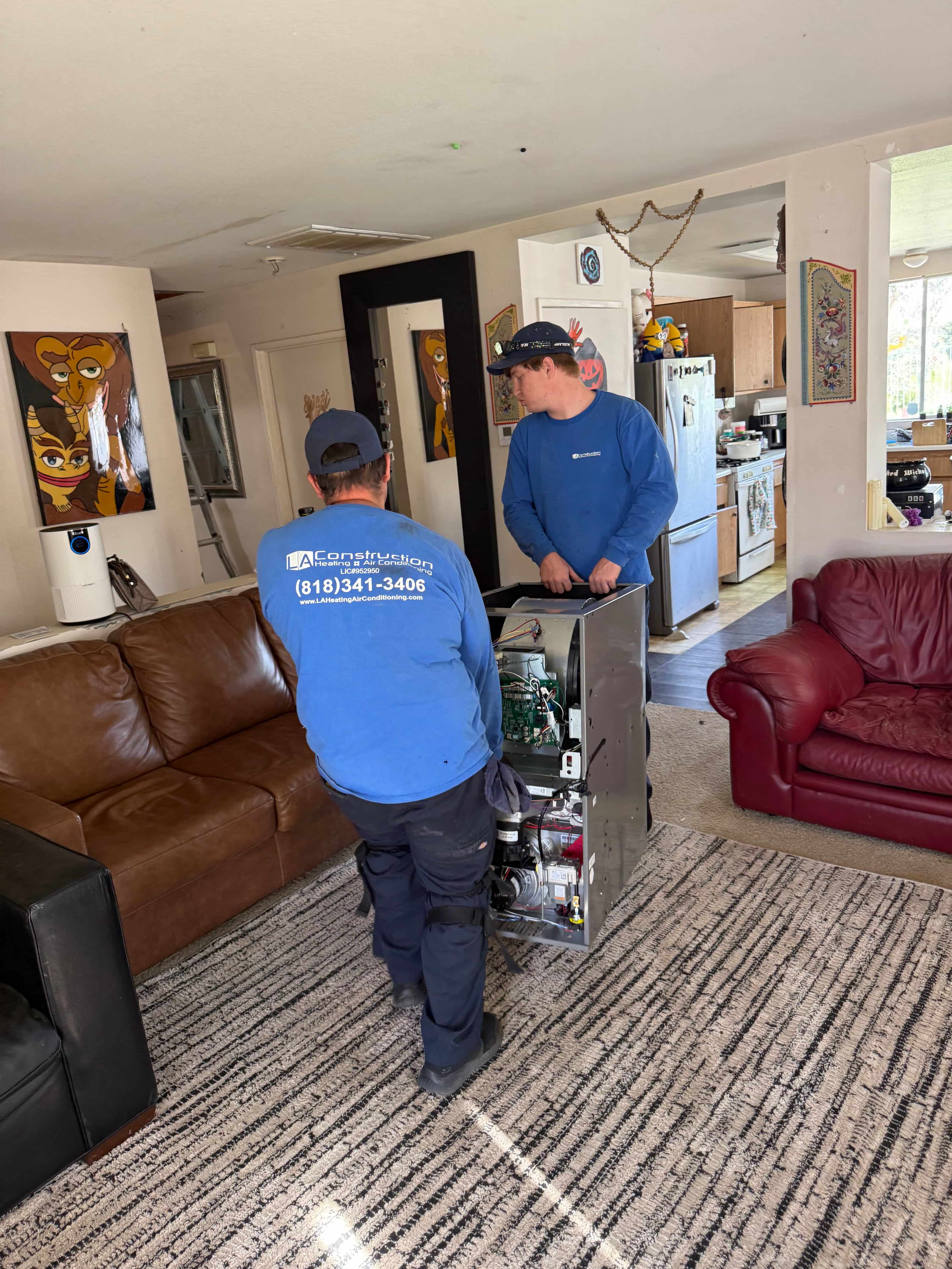 Technician fixing ac system