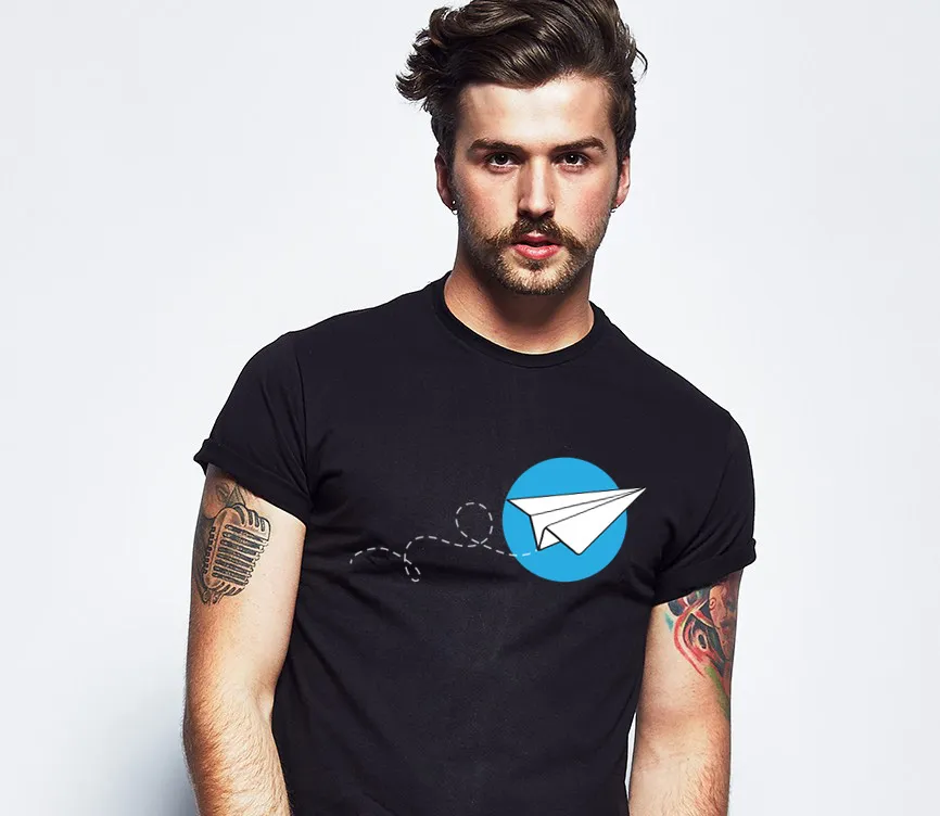 Model wearing a Giving to Fly t-shirt