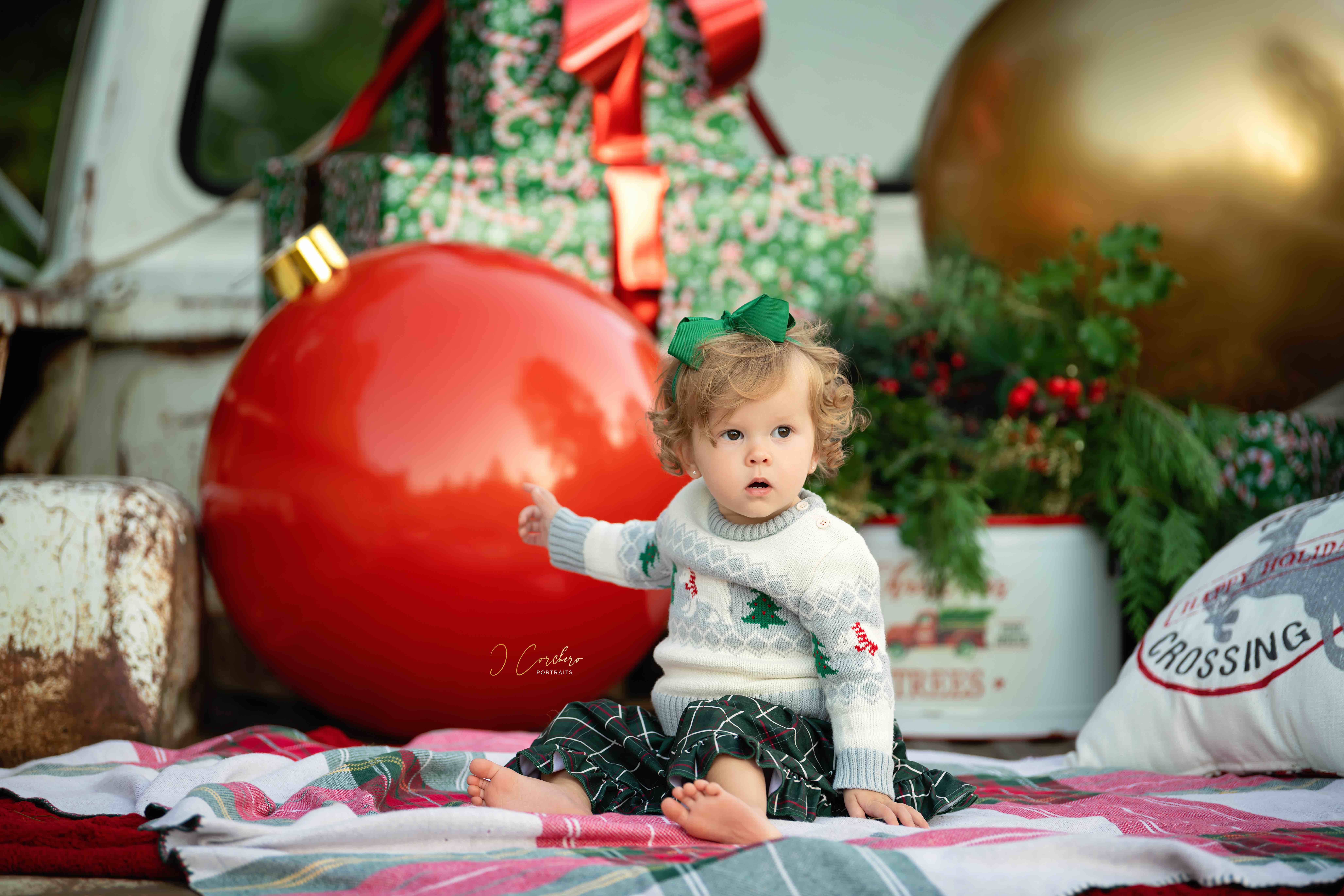 white truck christmas decor with three kids