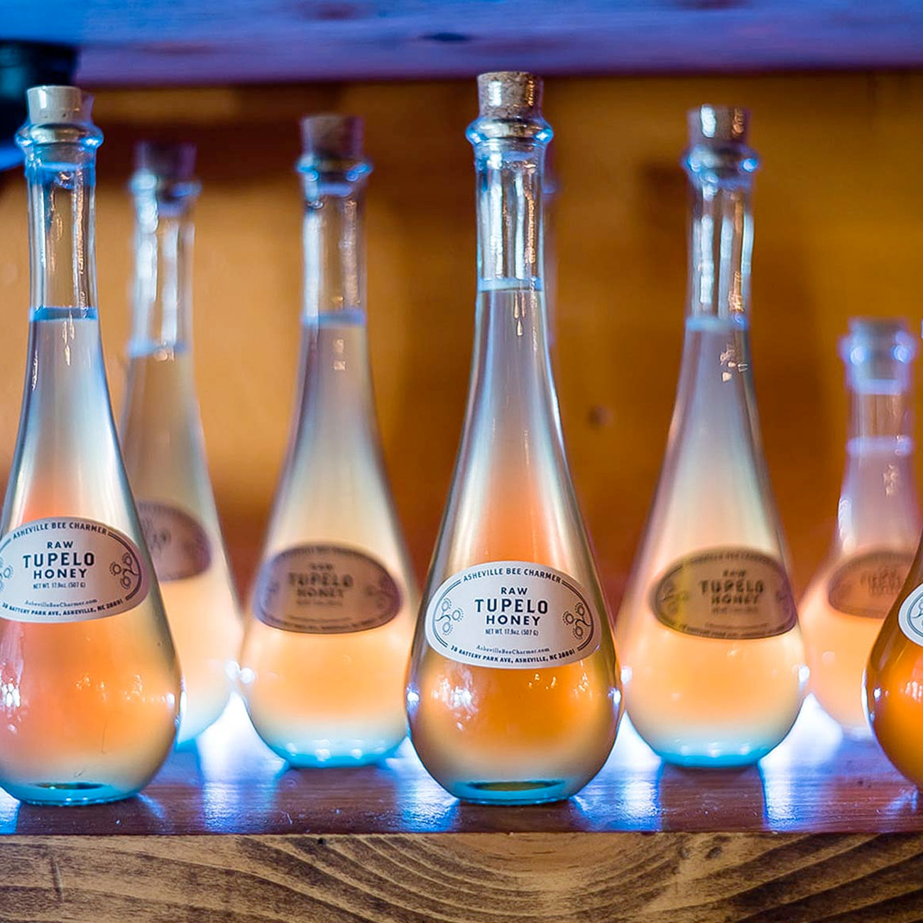 Decorative honey in glass bottles