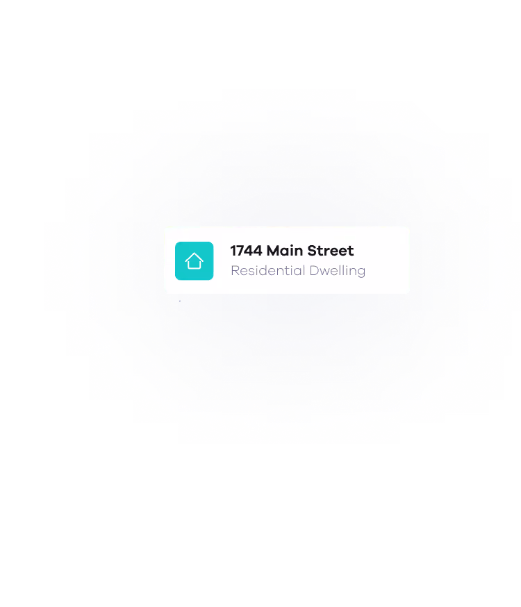 Label with a turquoise house icon and text '1744 Main Street' in bold, with 'Residential Dwelling' in lighter font below.