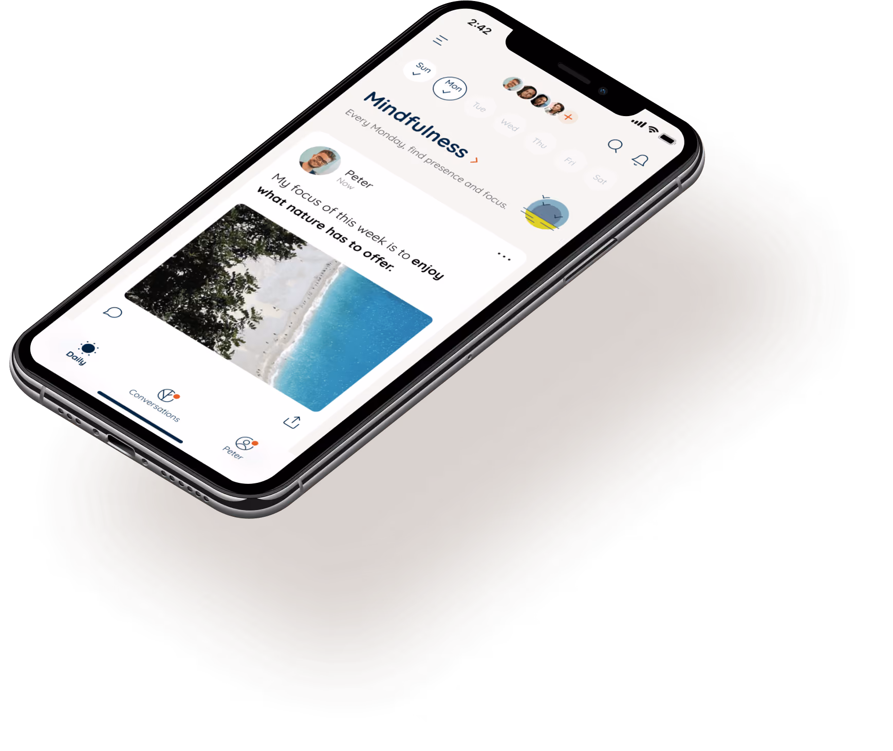Smartphone displaying a mindfulness app with a post from Peter focusing on enjoying what nature has to offer, showing a beach photo.