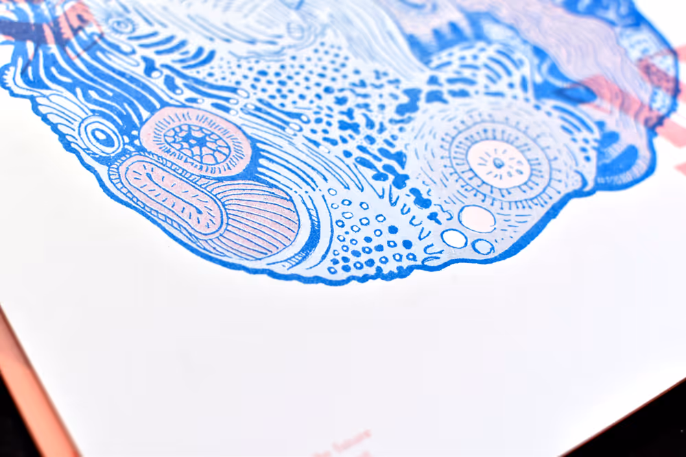 Moniker Press Calendar - Full spread view showing illustration spanning monthly layout with date information