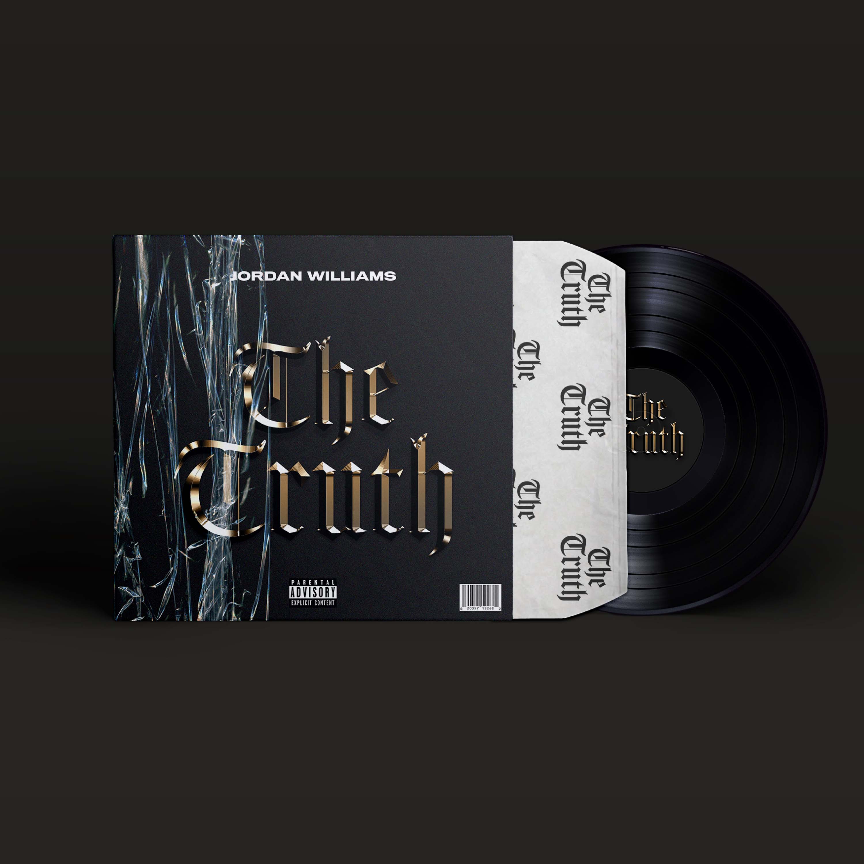 Vinyl record partially pulled out of black and white sleeve with text 'The Truth' on cover and inner sleeve, along with artist name Jordan Williams.