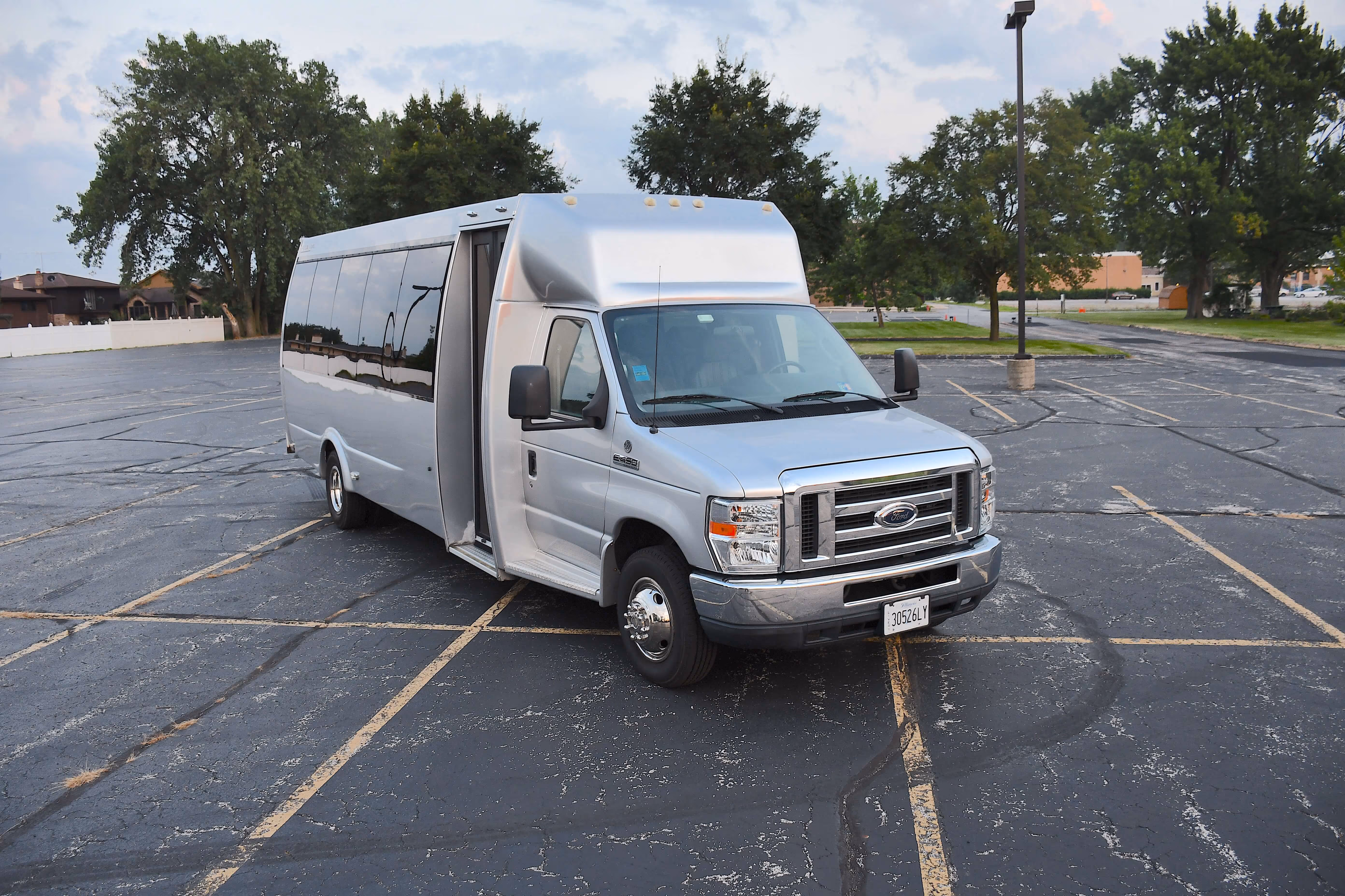 Silver bus provided by A Stars Limo