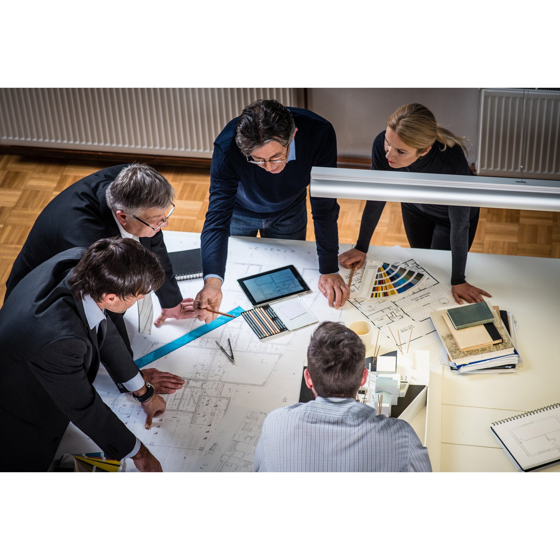 Architectural plans and material samples used during smart-home planning