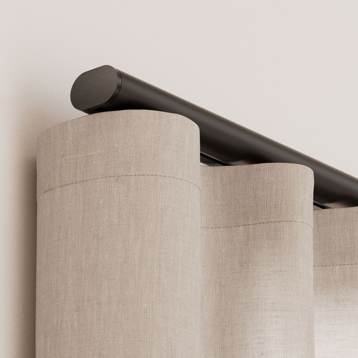 Lutron Palladiom Drapery exposed automated track with custom pinch pleat fabric