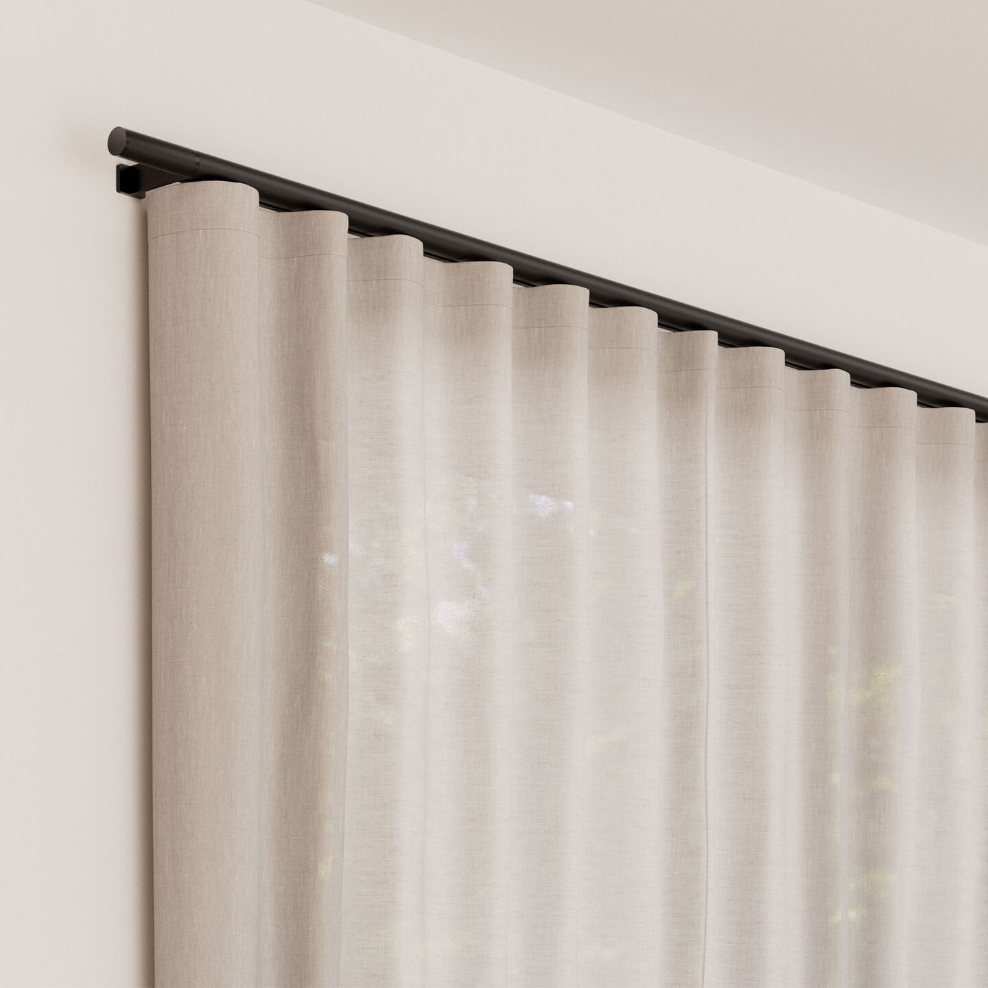 Full view of Lutron Palladiom Drapery with light neutral fabric on an exposed dark architectural track