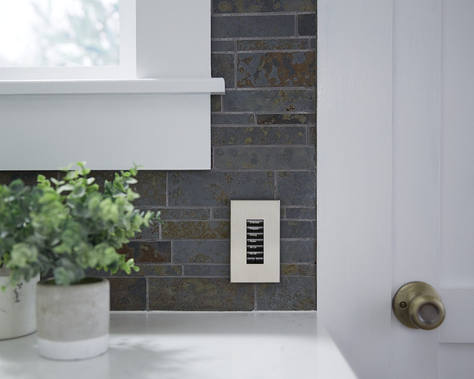 Lutron seeTouch keypad controlling motorized shades in a residential room