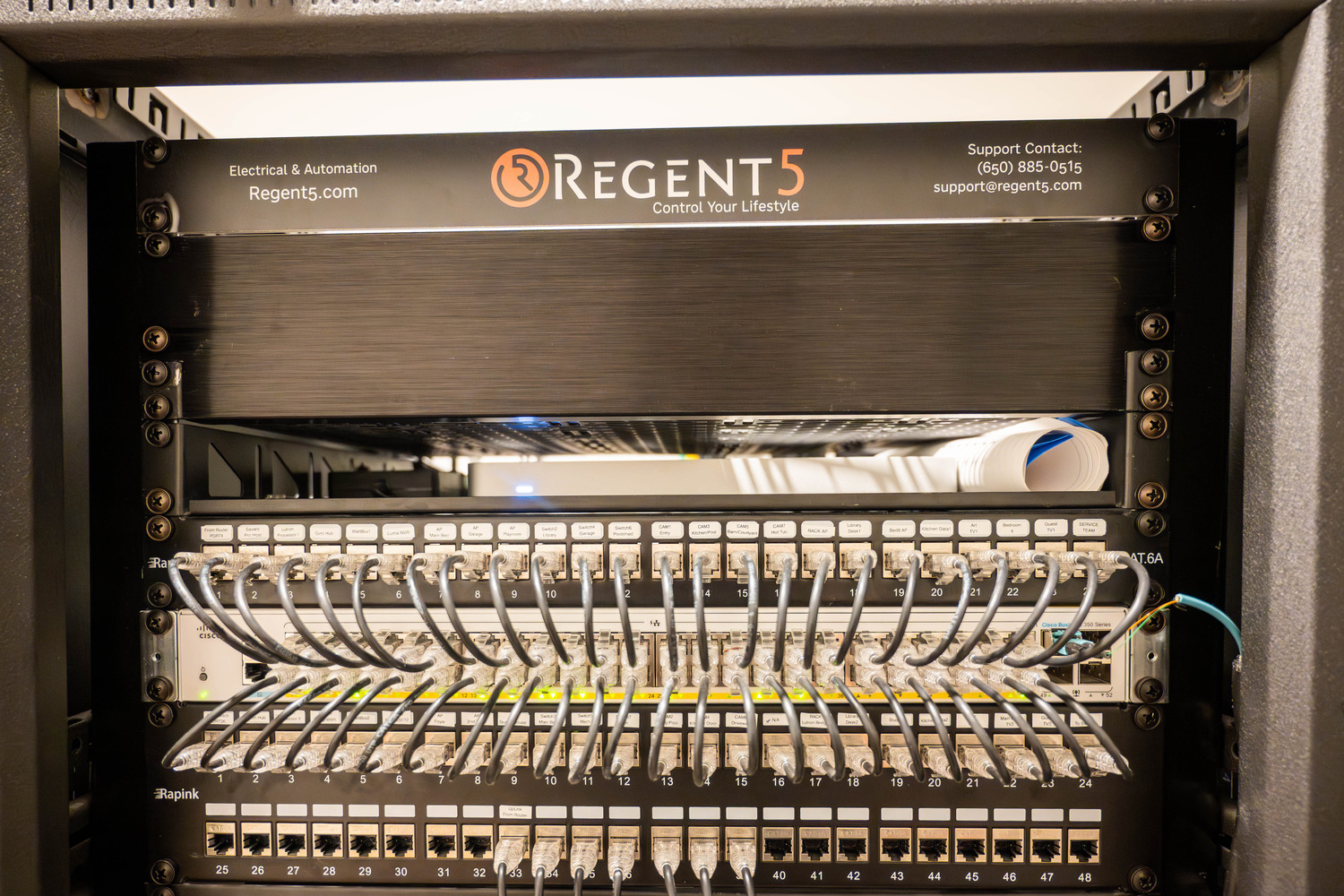 Regent5 equipment rack showing centralized residential technology hardware