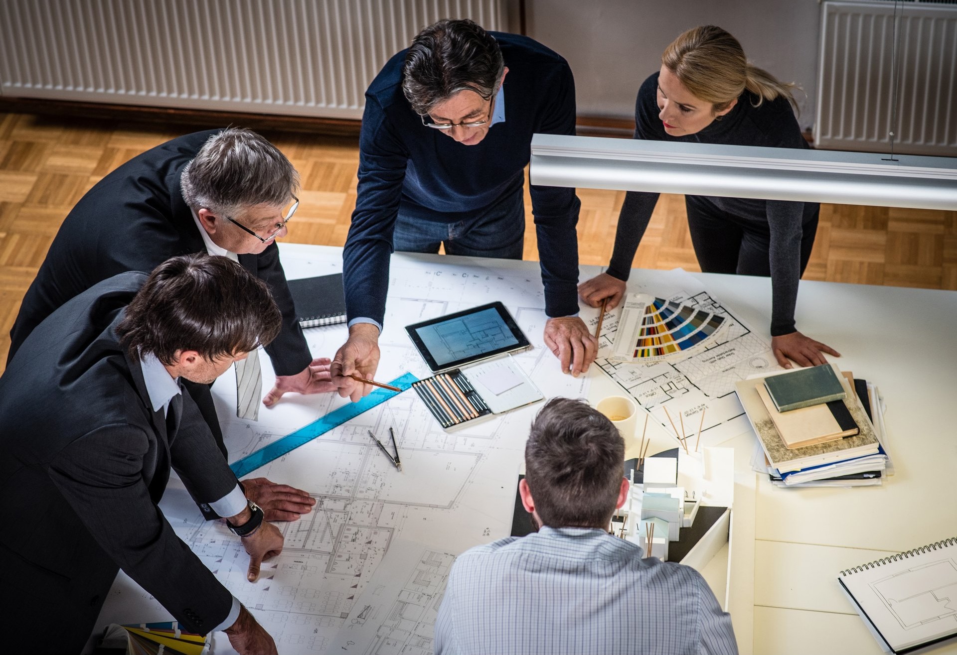 Architectural plans and finish samples for a new smart-home project