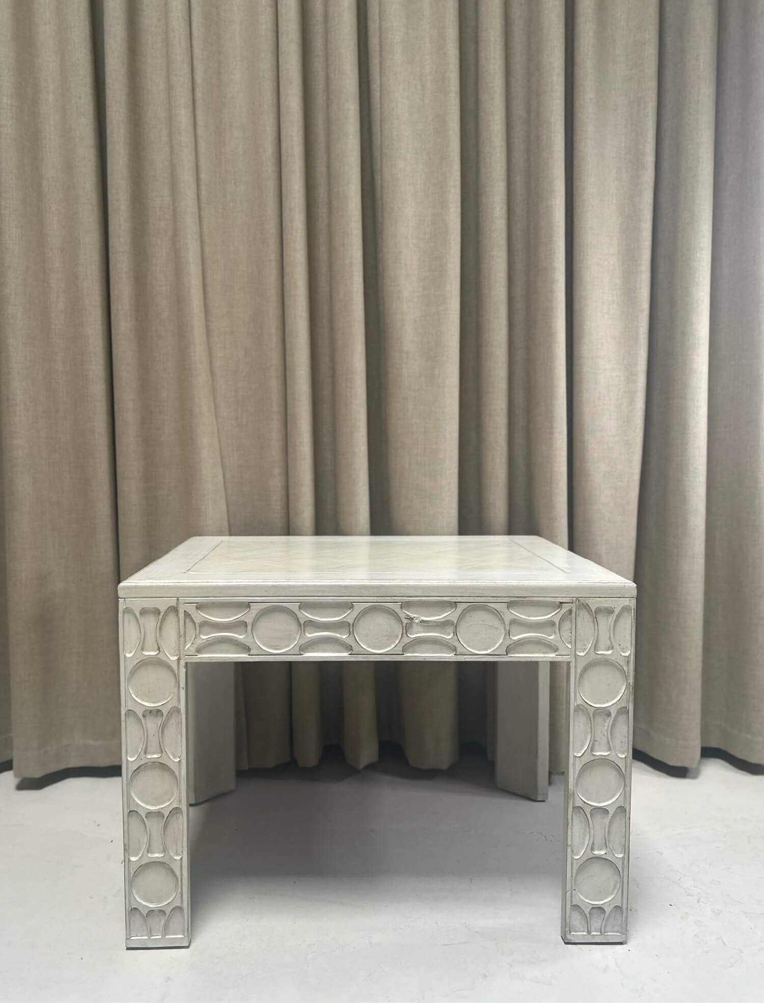 carved side table