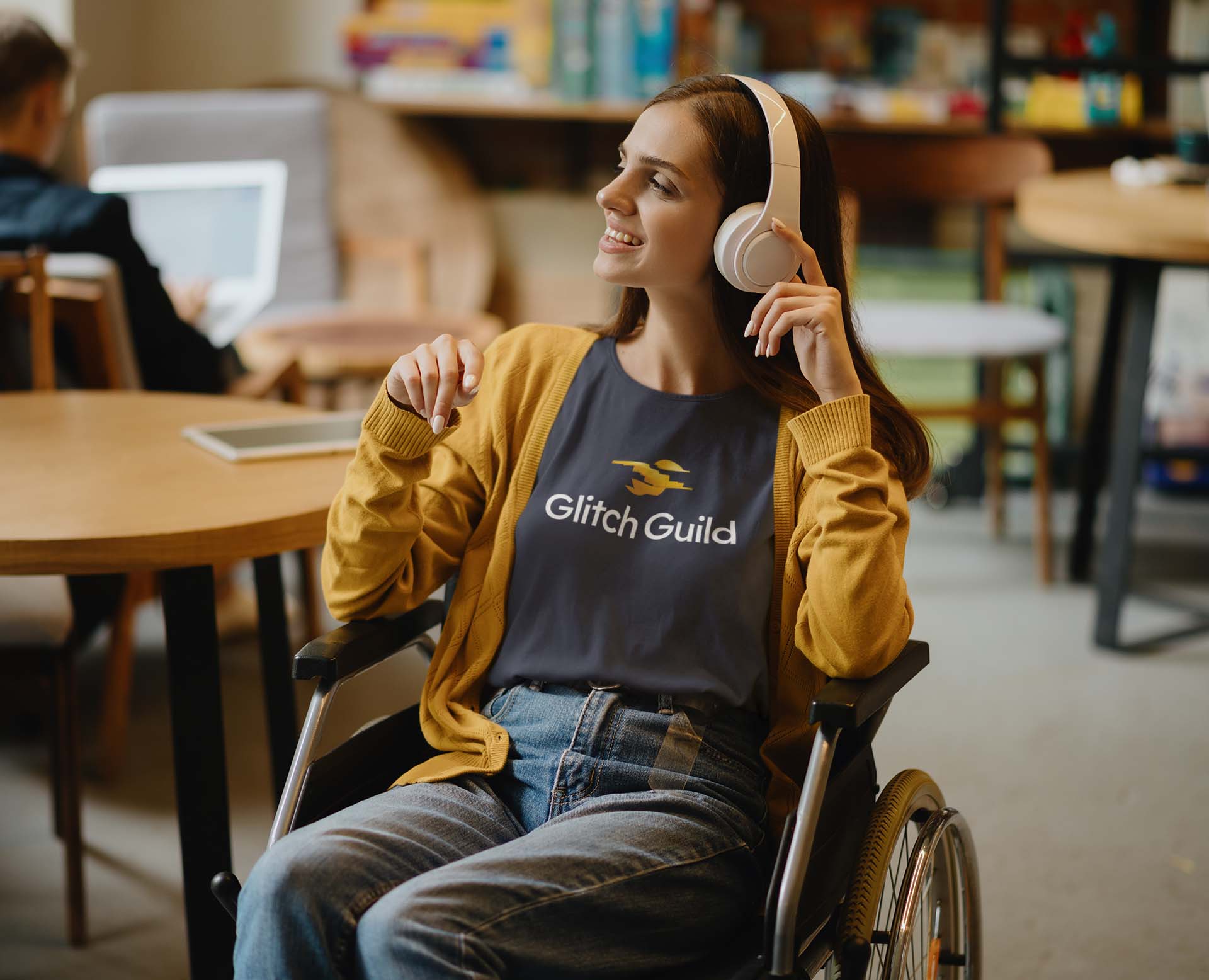 Glitch Guild Logo on a disabled girls t-shirt