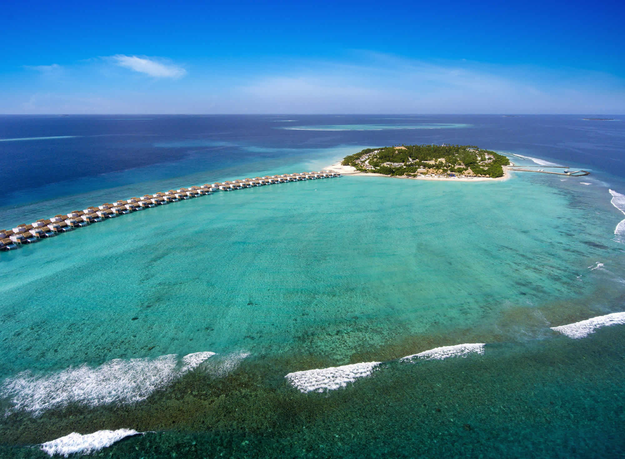 Emerald Maldives island aerial view