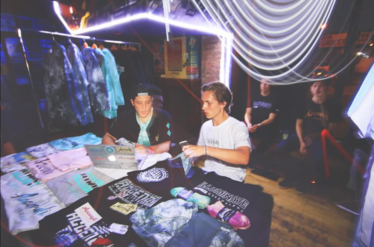 Photo of Accendi's owner and founder, James Cannella, working the booth at the 2-year anniversary concert event for Lyrical Lemonade hosted by Cole Bennett