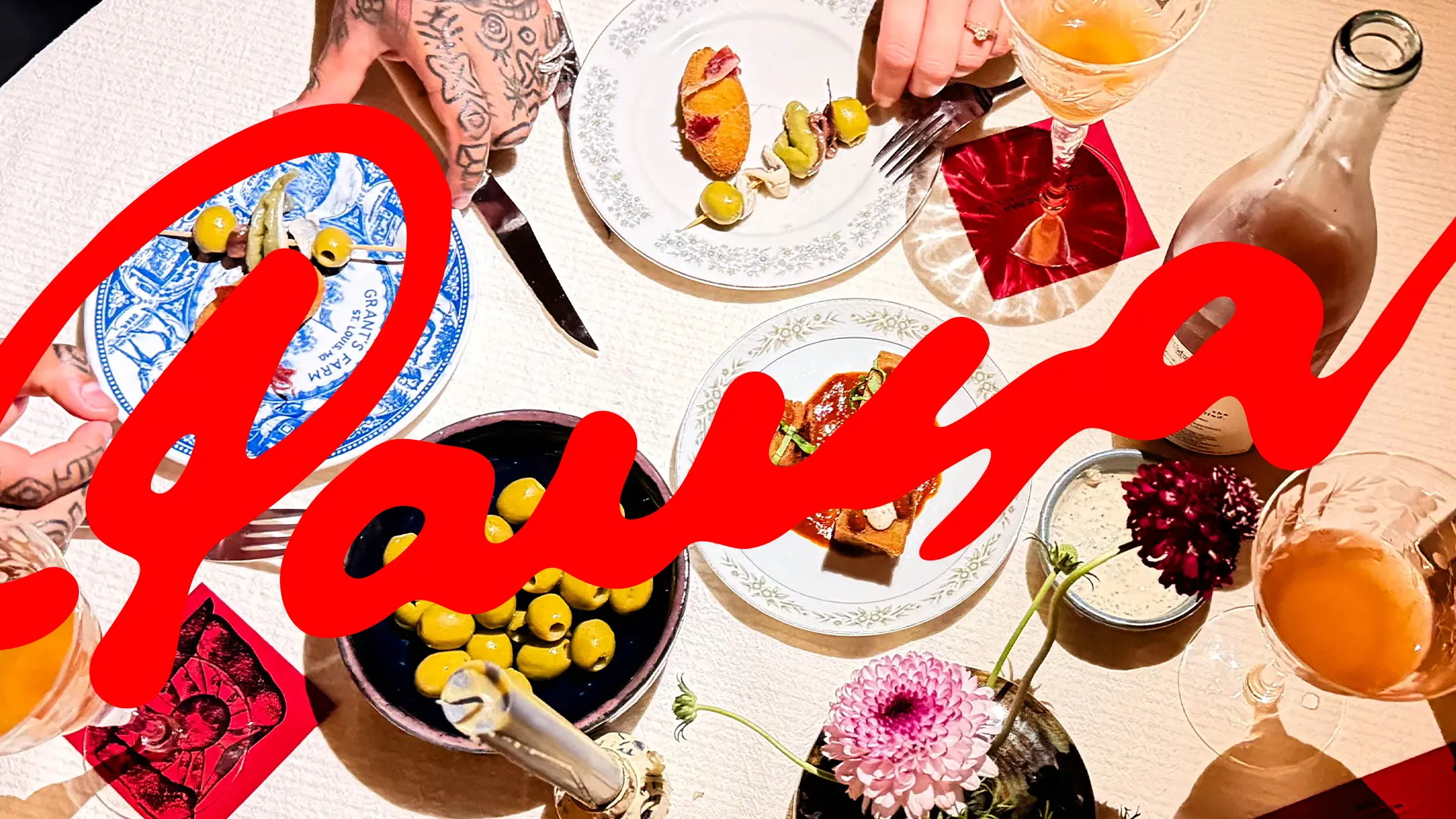 Pausa logo over dining photo