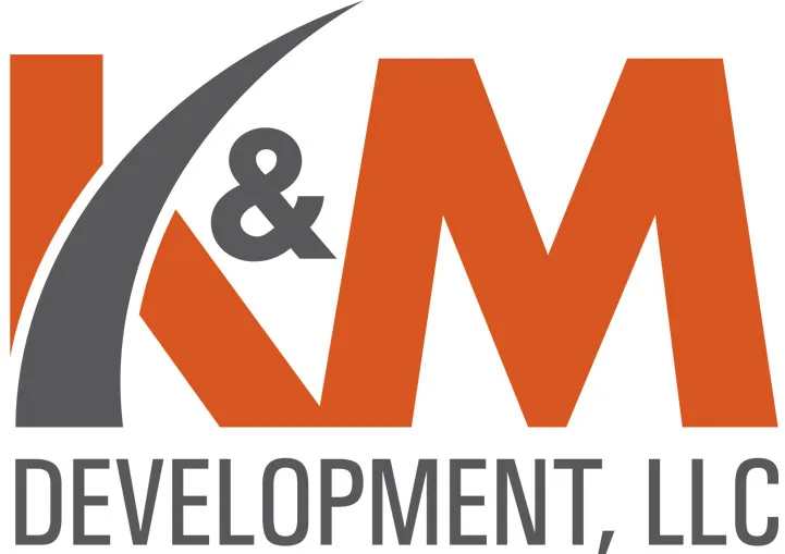 K&M Development logo