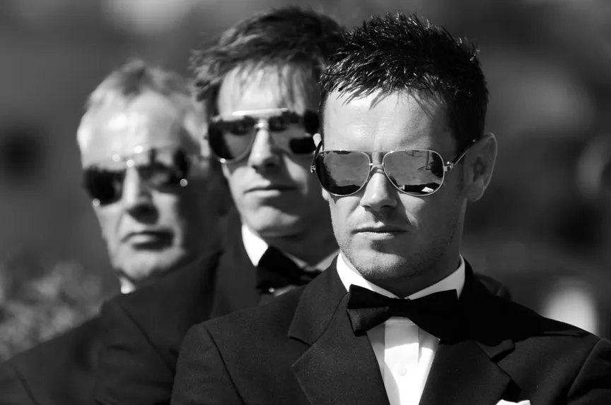 men in tuxedo with sunglasses in black and white at Zoetry Majorca