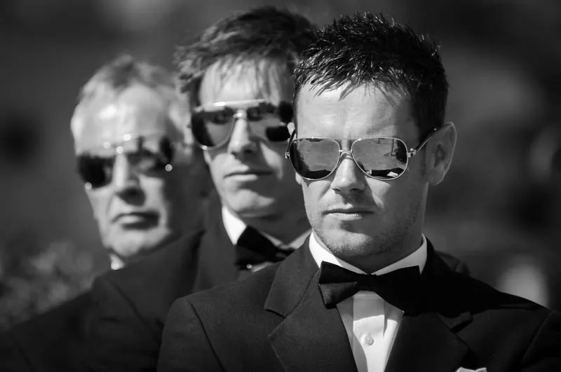 men in tuxedo with sunglasses in black and white at Zoetry Majorca